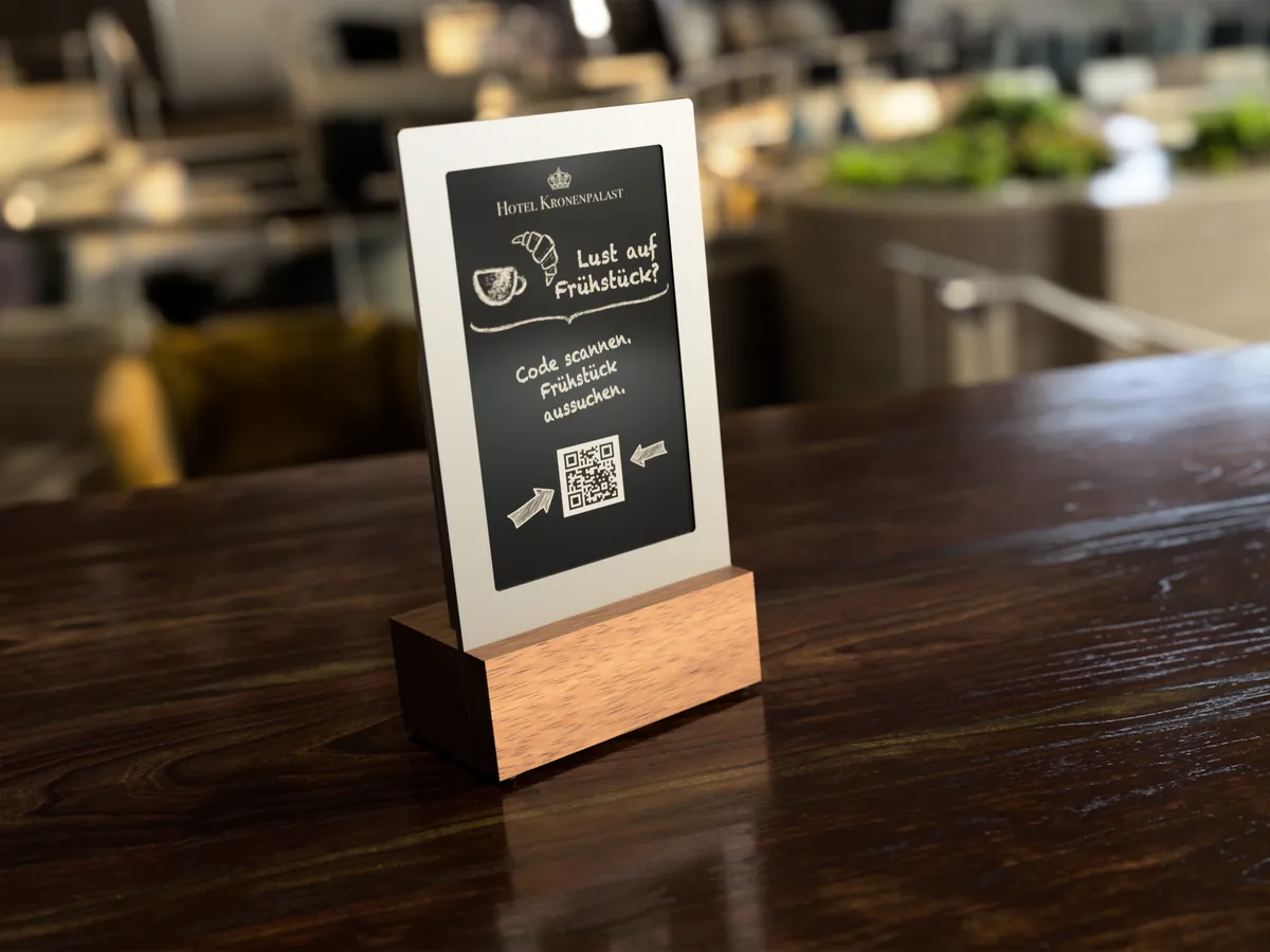 Diwa inviting guests to breakfast with a QR code
